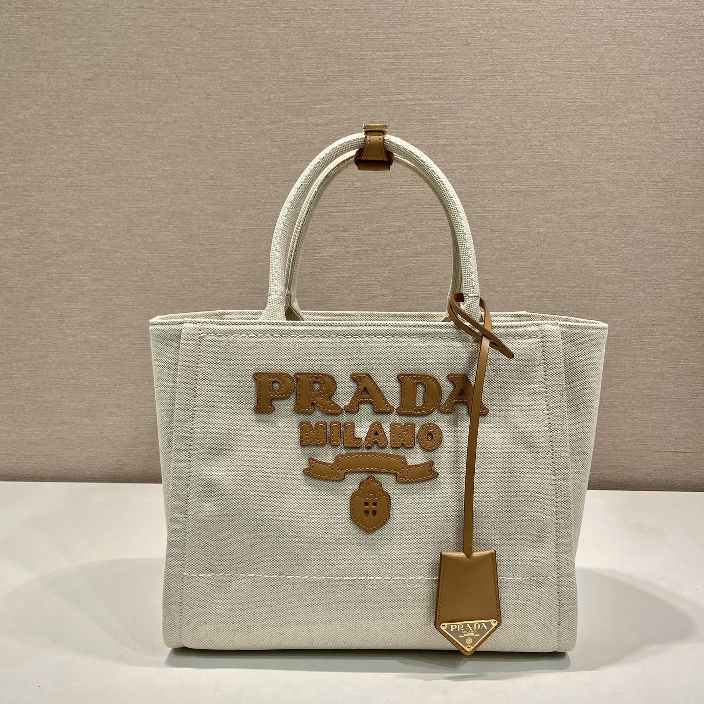 Pra*a top handle bags